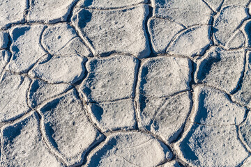 Polygon Cracked Clay Formed at The Bottom of a Dry Lake Bed Near The Mesquite Flat Sand Dunes and Tucki Mountain, Death Valley National Park, California, USA