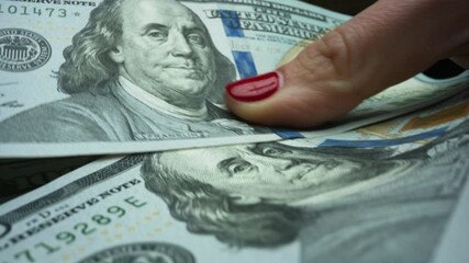 Female hands holding money cash. Businesswoman hands counting dollar banknotes - Powered by Adobe
