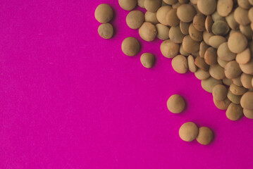 Many Raw Organic Lentil,  pink background