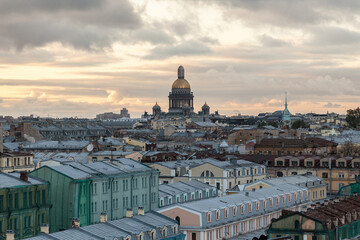 Fototapeta na wymiar Sunset citycape of Saint Petersburg with dome of Saint Isaac's cathedral