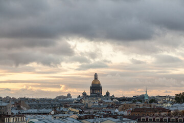 Fototapeta na wymiar Sunset citycape of Saint Petersburg with dome of Saint Isaac's cathedral