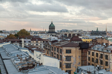 Fototapeta na wymiar Sunset rooftop cityscape of Saint Petersburg with view on Saint Isaac's and Kazan cathedrals