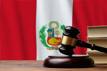 Justice and court concept in Republic of Peru. Judge hammer on a flag background