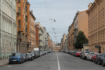 Street view with buildings and cars in the center of Saint Petersburg in a cloudy day 