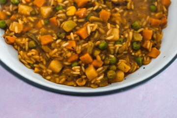 plant-based food, vegan stew with garden vegetables rice and cajun spices