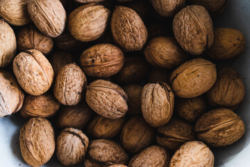 simple food ingredients, bowl of walnuts on kitchen counter