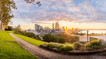 Cityscape of Perth Western Australia as the sun rises. The photo was taken in Kings Park	