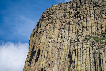 Close up detail view of the vertical basalt columns of Devils Tower National Monument in Wyoming