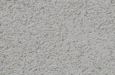 Obraz premium concrete wall background Light beige concrete wall (background, texture), close-up top view.