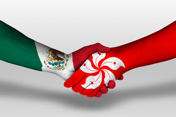 Handshake between hong kong and mexico flags painted on hands, illustration with clipping path.
