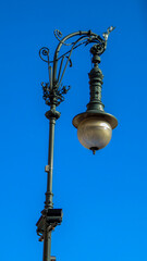 Fototapeta na wymiar street lamp on blue sky