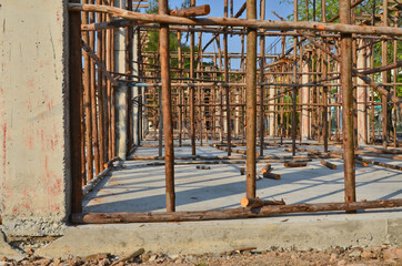 Fototapeta na wymiar Wooden scaffolding for concrete building construction