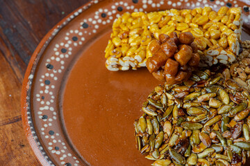 palanqueta de cacahuate pepita muégano barra de frutos secos dulce tradicional mexicano fruta con...