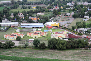 Aerial view of urban camp, houses and vegetation in the town of San Juan Teotihuacan Mexico