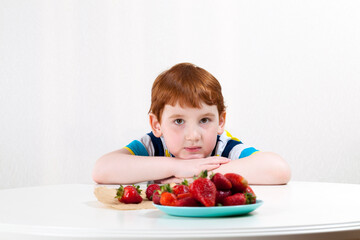 boy and strawberries