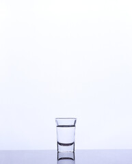 mineral water in a glass isolated white background