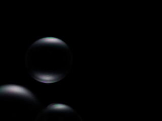 Soap bubble on black background