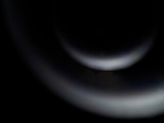 Soap bubble on black background