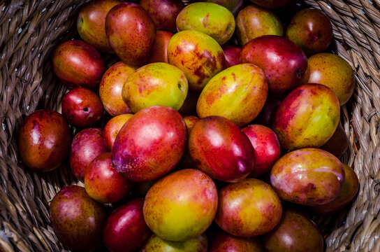 Red Plum Harvest Background
Wicker basket filled with freshly picked red plums from Herefordshire