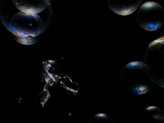 Soap bubble on black background