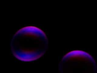 Soap bubble on black background