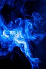 Blue smoke motion on black background.