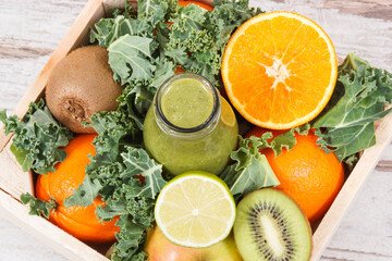 Freshly blended coctail from fruits with vegetables as healthy dessert containing vitamins and...