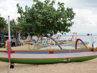 fishing boats on the beach in sanur bali