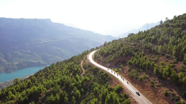 Motorcycle riders are touring on the Taurus Mountains.