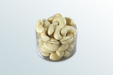 Set of delicious cashew nuts in the glass bowl, grain with salt ready to eat, Selective focus, Roasted nuts, kaju, studio shot