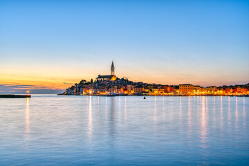 The old town of Rovinj in Croatia with the iconic Saint Euphemia church after sunset