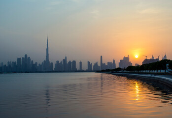 Fototapeta premium Sunset over a skyline of a beautiful city of Dubai. UAE.