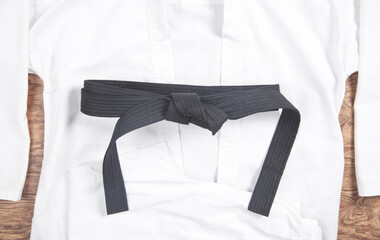 Martial arts clothes. Karate uniform with black belt