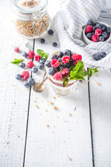 Fototapeta na wymiar Yogurt parfafait with granola and berries
