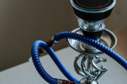 New generation electronic hookah or shisha. Modern hookah does not required charcoal can be charged and has internal battery.  