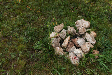 Heart shaped stones on the grass
