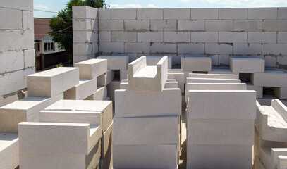 Construction of the walls of the house from foam concrete bricks.