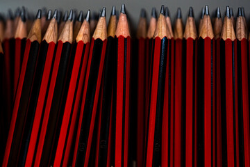 Red pencils in stock for school. Selective focus close up. High quality photo