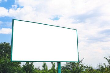 Blank advertising billboard on city street