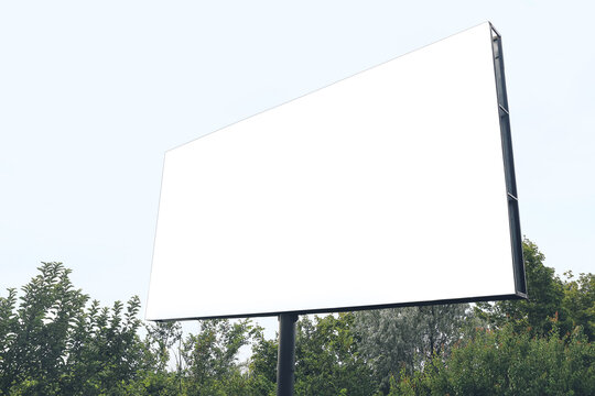 Blank advertising billboard on city street