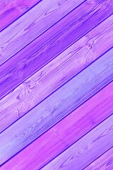 Striped wooden background diagonal abstract purple bright trendy neon color with boards surface texture, retro style concept