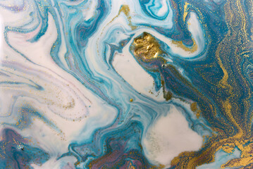 Blue wave pattern with layers of gold sequins.