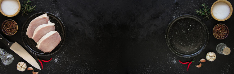 Cut raw beef with spices in plate and Empty plate on a dark metal background. Top view with copy space.