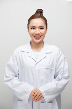 Young Attractive Asian Woman In A White Coat