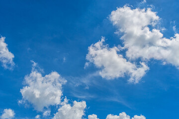 Naklejka na ściany i meble White Clouds in Blue Sky