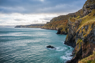 Fototapeta na wymiar Scenic view over coastline and sea in the Northern Ireland in winter. Concepts: landscape, outdoor, tourism, travel