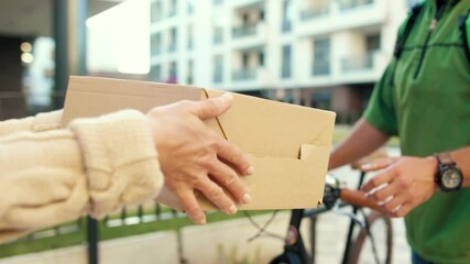 Close up hands courier man give box woman customer outdoor service home package send holding purchase postal shipment express parcel slow motion
