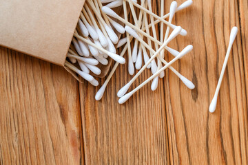 Eco cotton buds made of wood. Eco-friendly cotton ear sticks