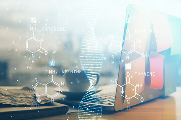 Desktop computer background and DNA drawing. Double exposure. Science concept.