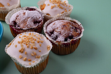 yummy sweet tasty muffin cakes on simple mono color background